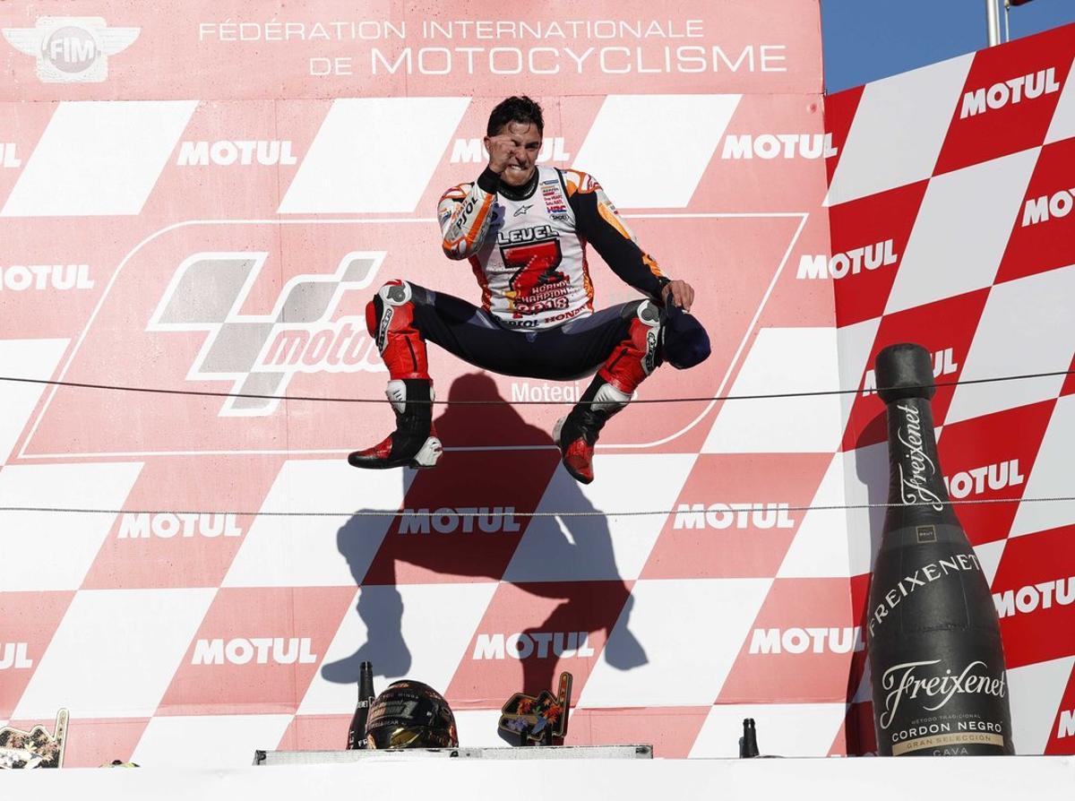 MotoGP - Japanese Grand Prix - Twin Ring Motegi, Motegi, Japan - October 21, 2018 Repsol Honda’s Marc Marquez celebrates winning the MotoGP race and the MotoGP world title on the podium REUTERS/Toru Hanai