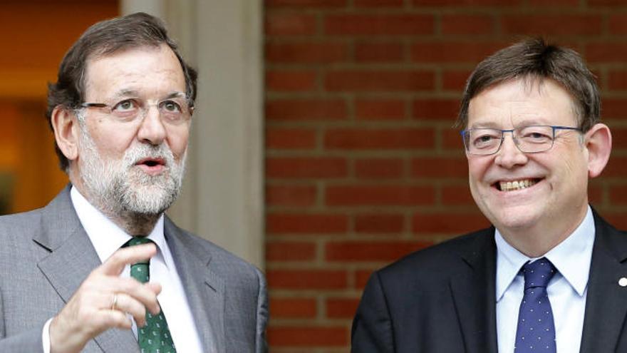 El presidente del Gobierno, Mariano Rajoy, junto al jefe del Consell, Ximo Puig, en el encuentro que ambos mantuvieron a principios de este mes