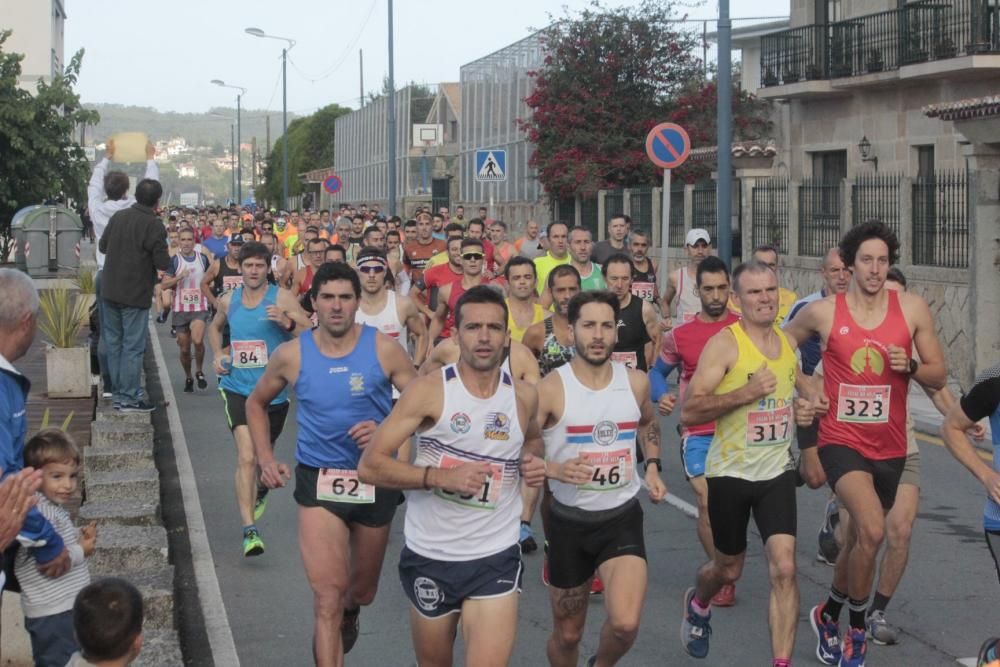 Prieto y Figueroa se cuelgan el oro en la 21K Costa da Vela. // Santos Álvarez