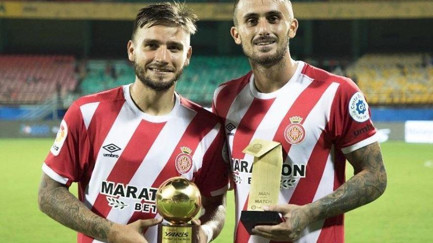 Portu i Aleix García al final del partit