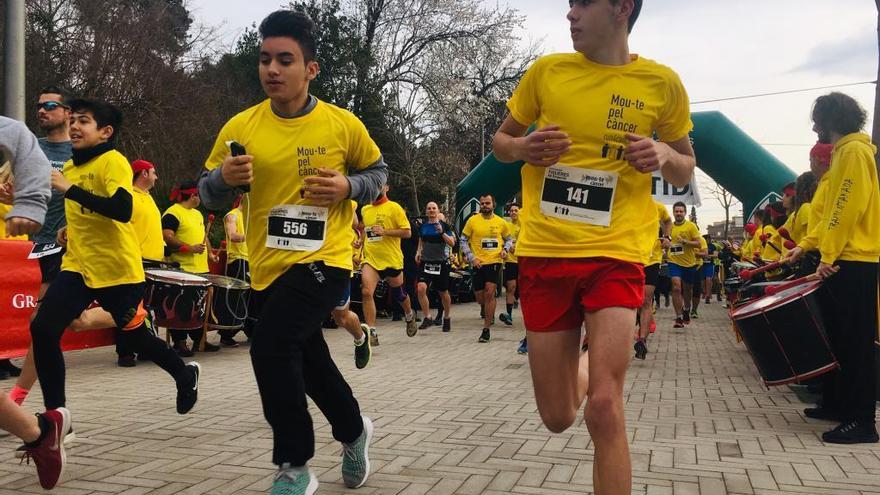 La cursa Run4Cancer al passeig Nou de Figueres.