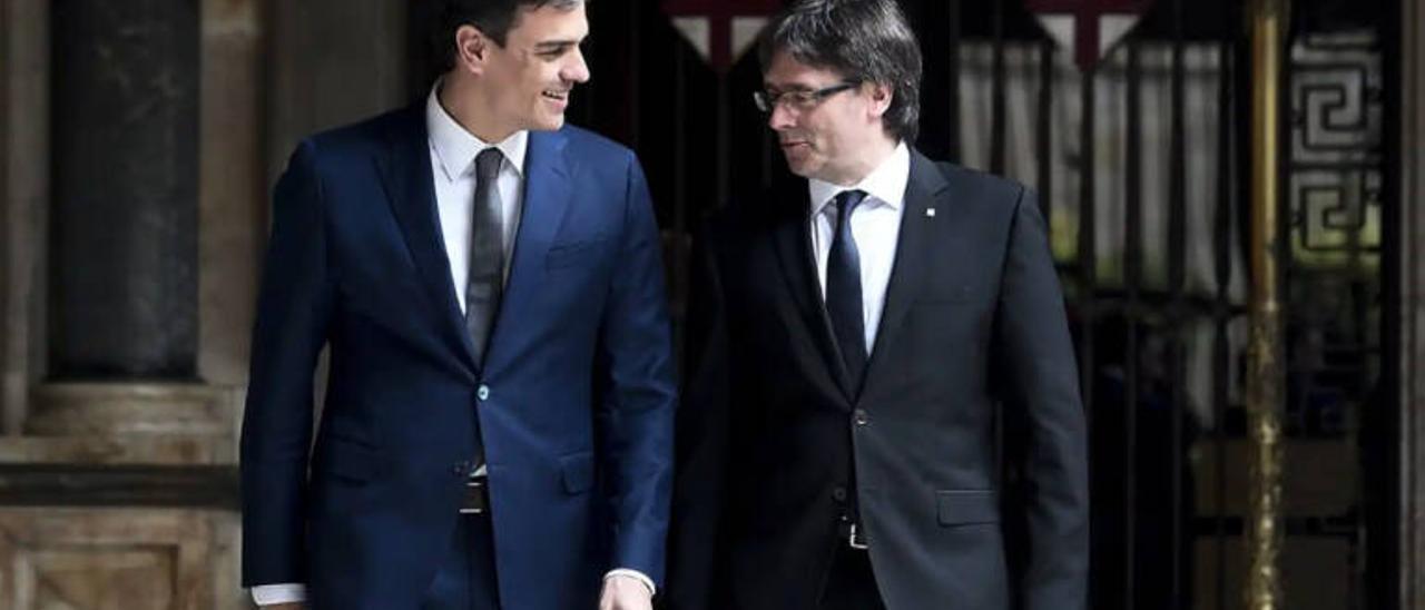 Pedro Sánchez y Carles Puigdemont en una imagen de archivo.