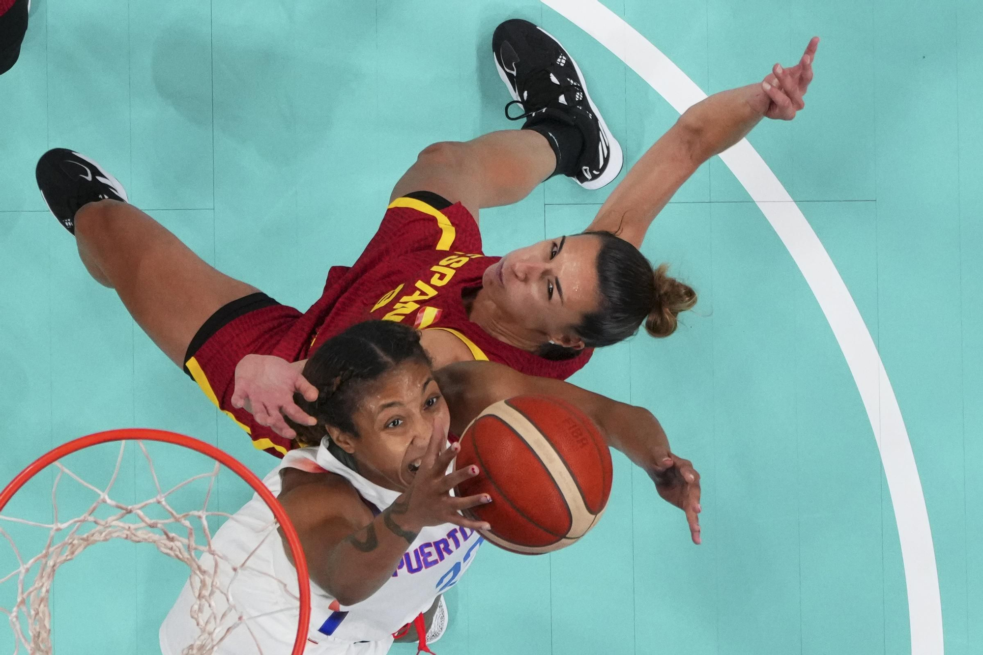 Baloncesto en los Juegos Olímpicos: Puerto Rico - España, en imágenes