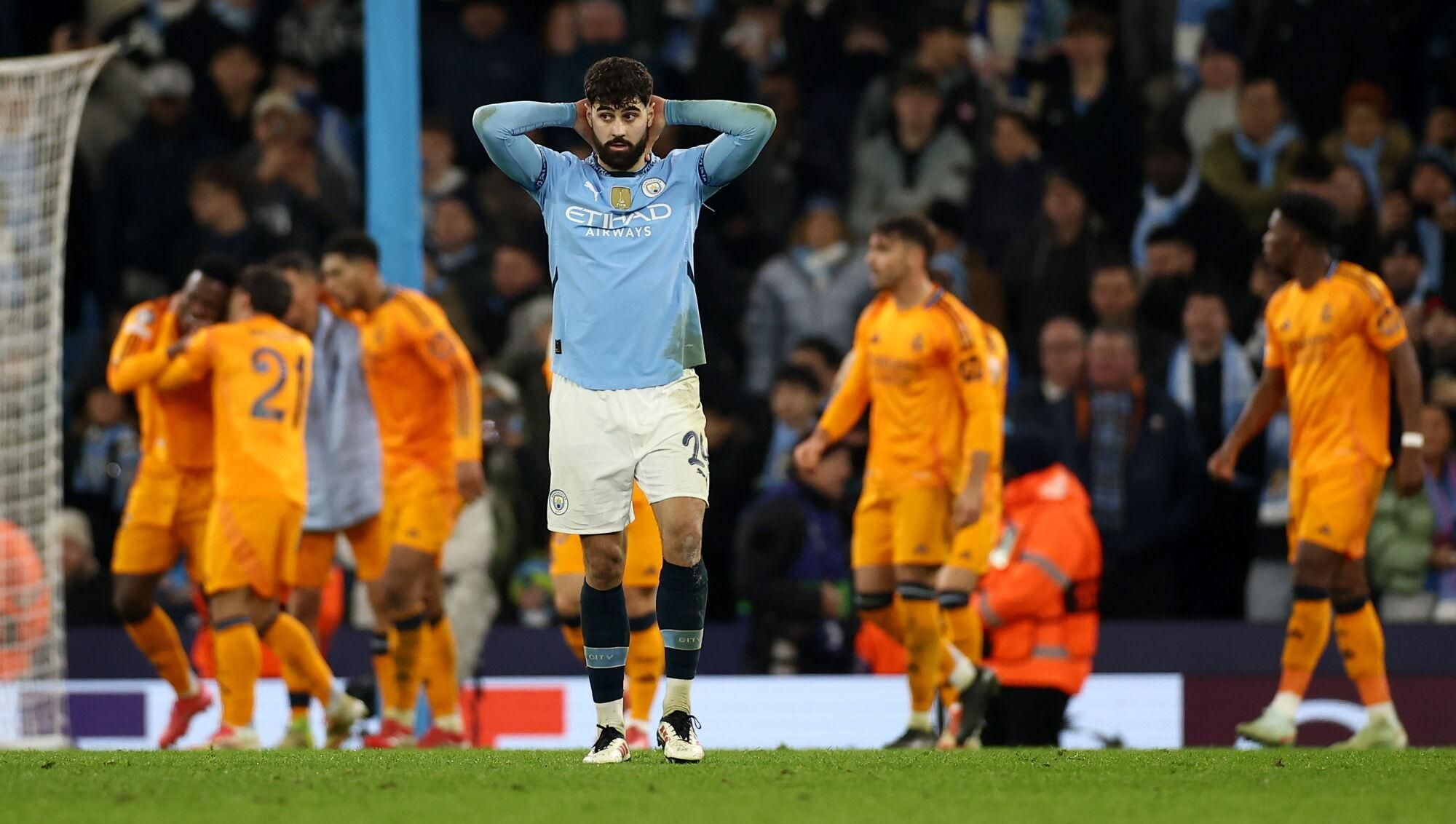 MANCHESTER (United Kingdom), 11/02/2025.- Josko Gvardiol of Manchester City reacts as Real Madrid players celebrate their third goal during the UEFA Champions League knockout phase play-offs 1st leg match between Manchester City and Real Madrid, in Manchester, Britain, 11 February 2025. (Liga de Campeones, Reino Unido) EFE/EPA/ADAM VAUGHAN