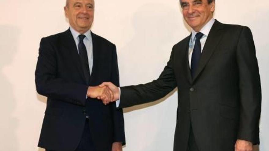 Alain Juppe i François Fillon, els rivals a les primàries, diumenge.