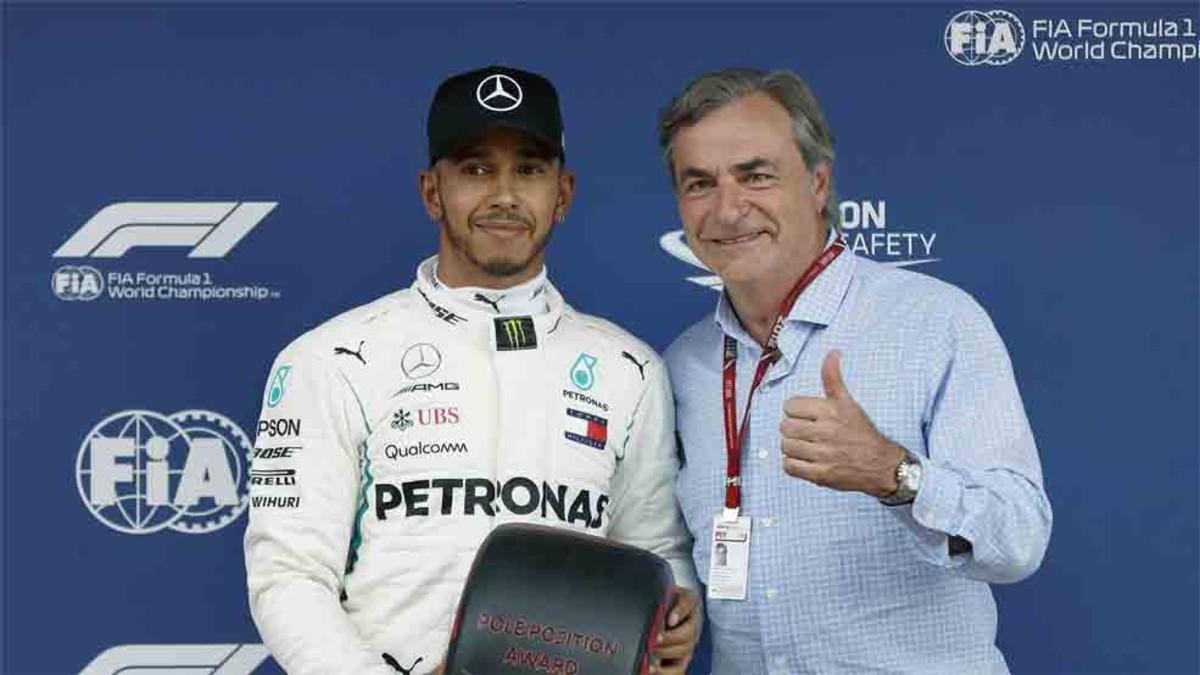 Carlos Sainz, junto a Lewis Hamilton