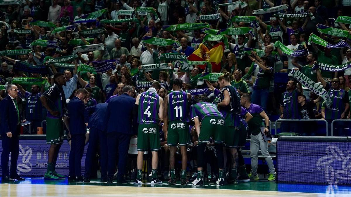 El Unicaja, reunido en un tiempo muerto.