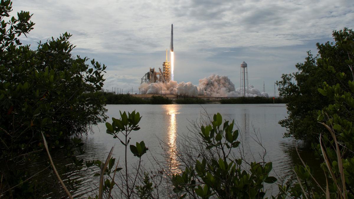FILE PHOTO: NASA handout photo of the SpaceX Falcon 9 rocket launching from pad 39A at the Kennedy Space Center in Cape Canaveral