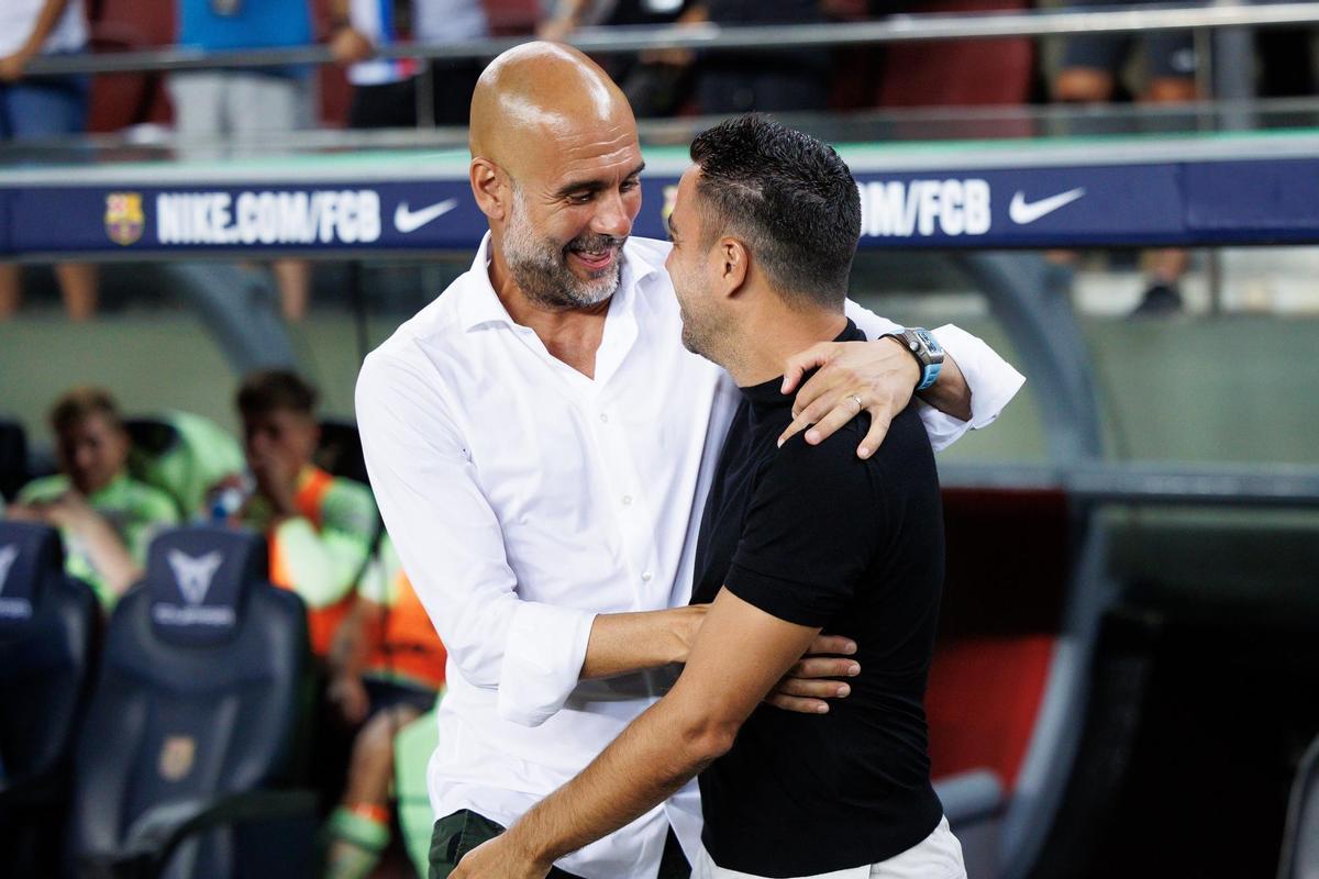 Xavi Hernández y Pep Guardiola