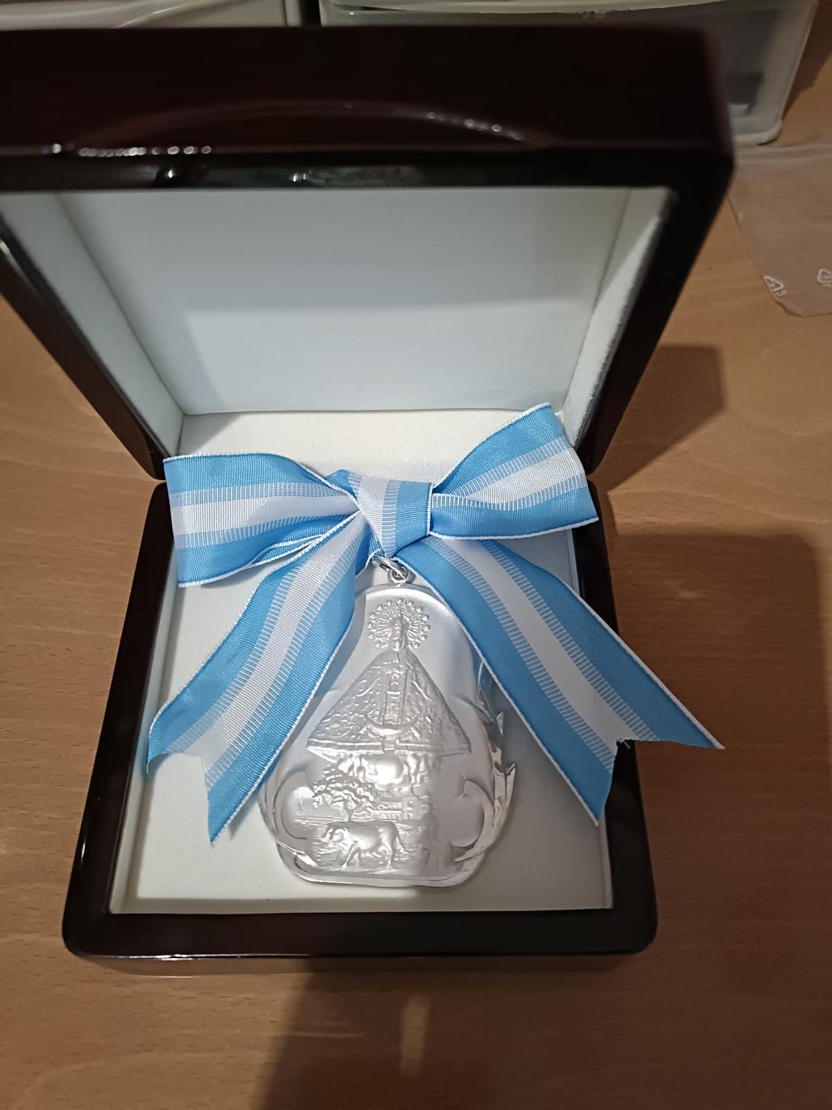 Medalla de plata de la Real Cofradía de la Virgen del Lledó.