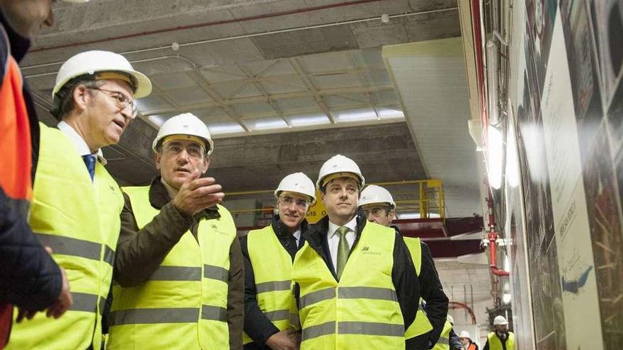 Feijóo, Ignacio Galán, Francisco Conde y Javier Palacios, ayer, en la inauguración.