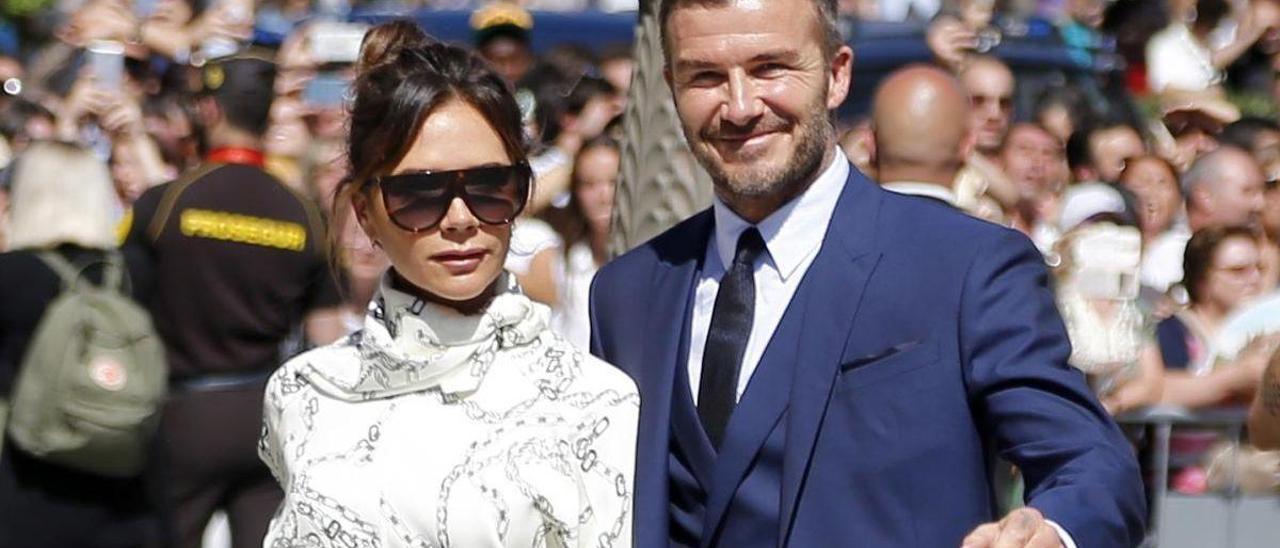 Victoria Beckham junto a su marido
