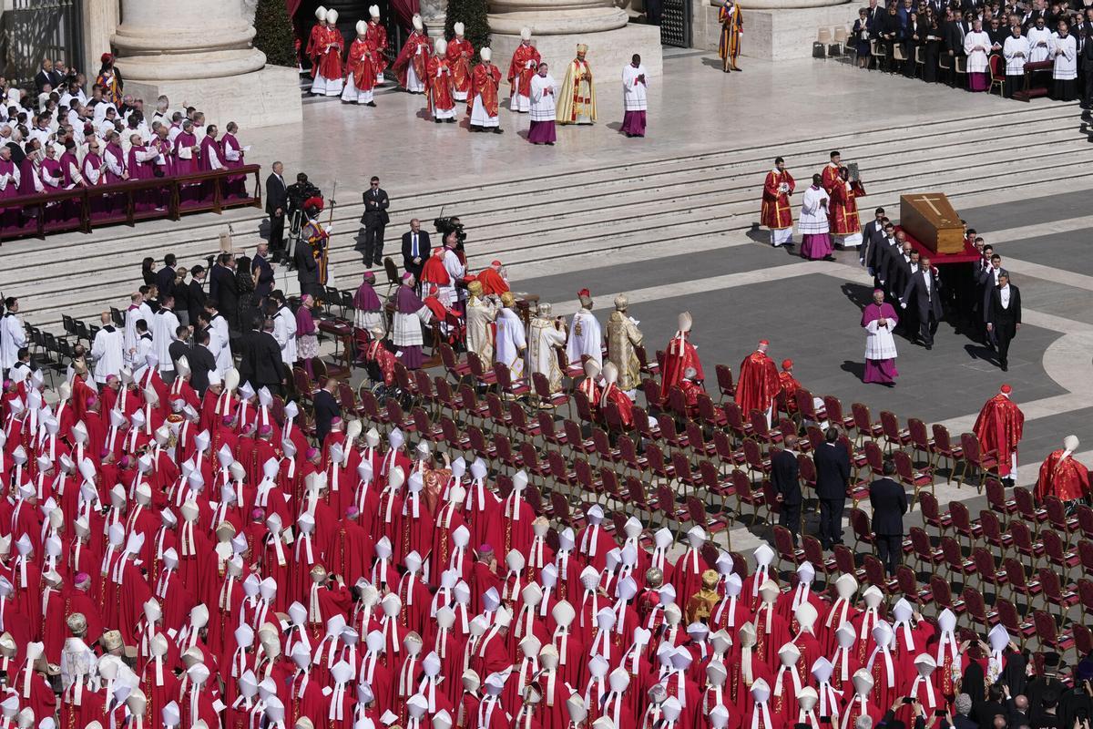 The coffin of Pope Francis is carried into St Peters Square for his funeral, at the Vatican, Saturday, April 26, 2025. (AP Photo/Gregorio Borgia). EDITORIAL USE ONLY/ONLY ITALY AND SPAIN