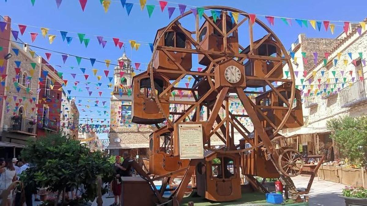La rueda de agua es el símbolo más característico de la Mostra d'Oficis Tradicionals de Sant Jordi.