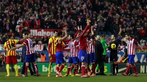 Imágenes del partido disputado entre el Atlético y el Barça.