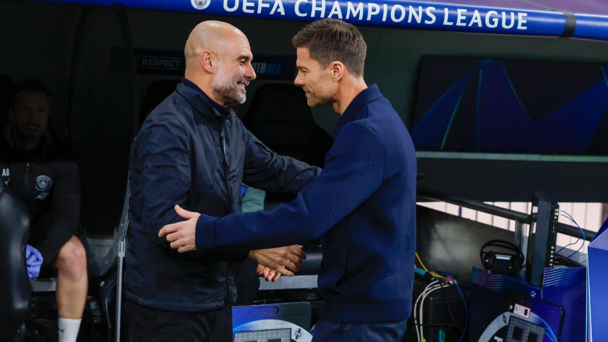 Xabi Alonso y Pep Guardiola, en el duelo entre Madrid y City
