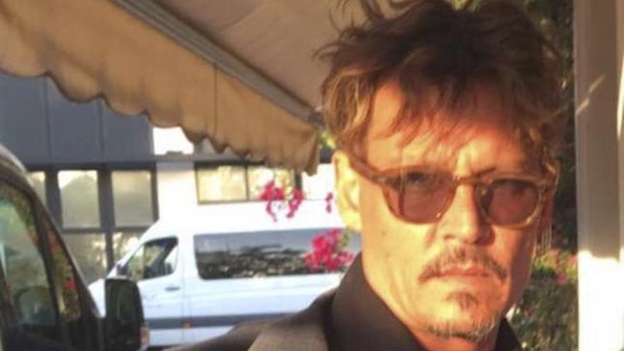 El actor Johnny Depp termina unas largas vacaciones en Ibiza