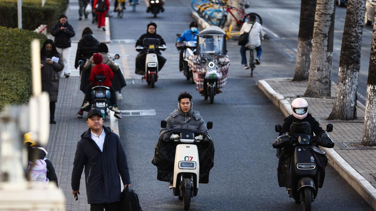 Scooters en las calles de Beijing, China