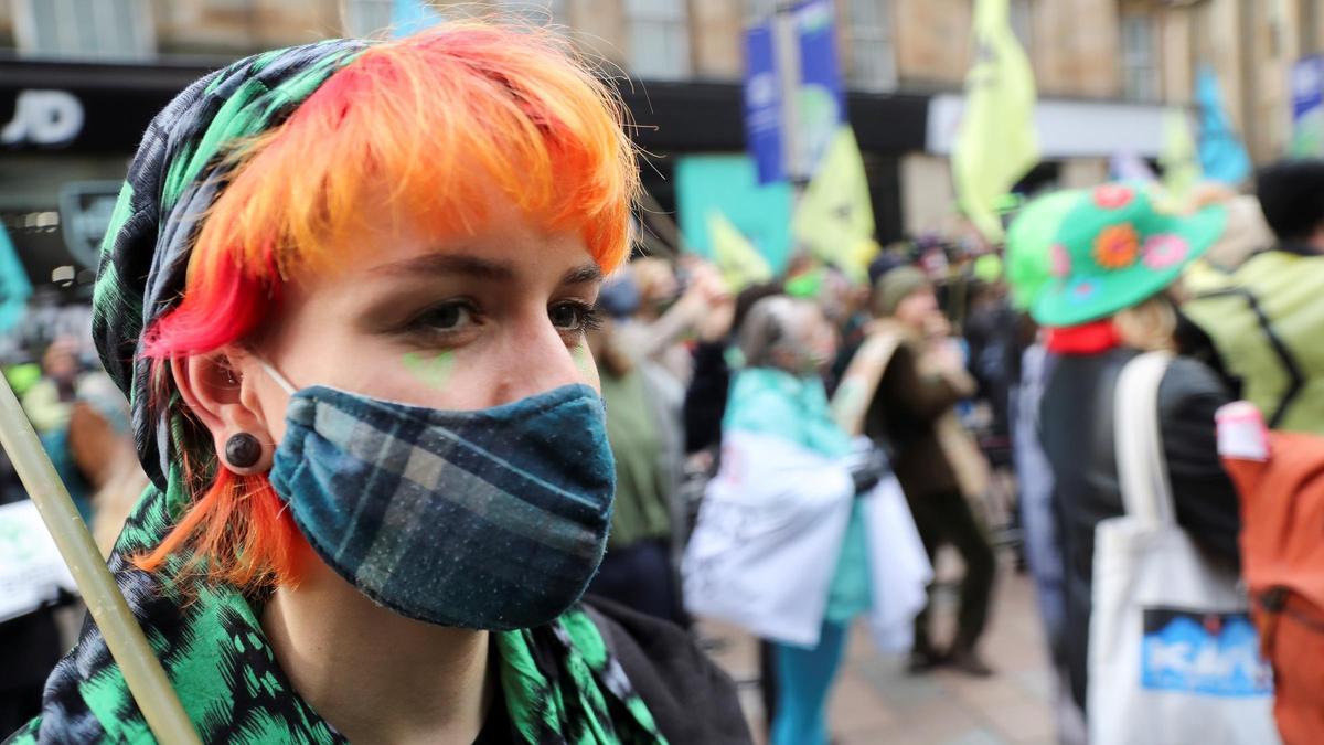 Activistas en la Cumbre del Clima de Glasgow.