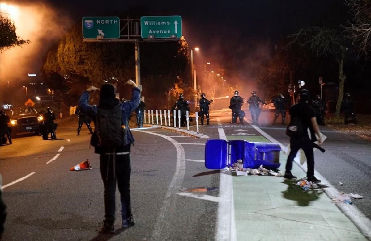 jgblanco36242650 police block a freeway entrance during a protest against the161111120559