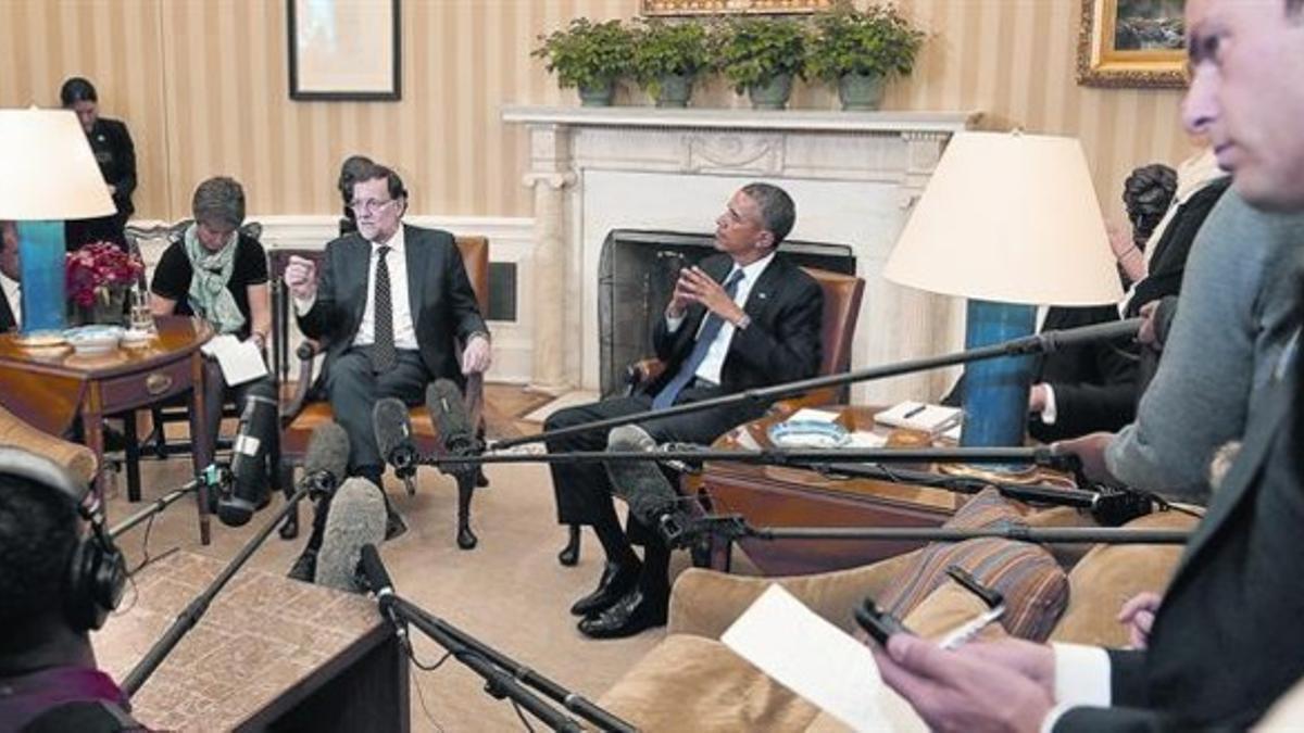 Rajoy y Obama atienden a los medios, ayer en la Casa Blanca.