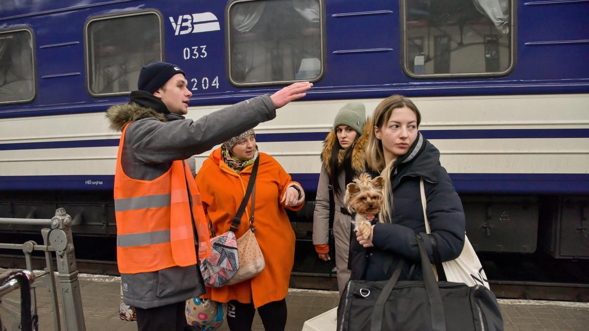 Ukrainian refugees at the train station in Lviv