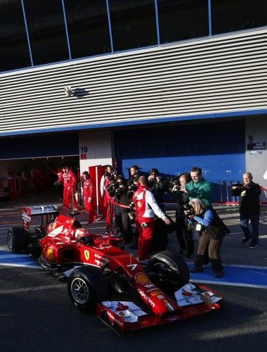 Ferrari Formula One racing driver Kimi Raikkonen of Finland drives the new F14 T during pre-season testing at the Jerez racetrack