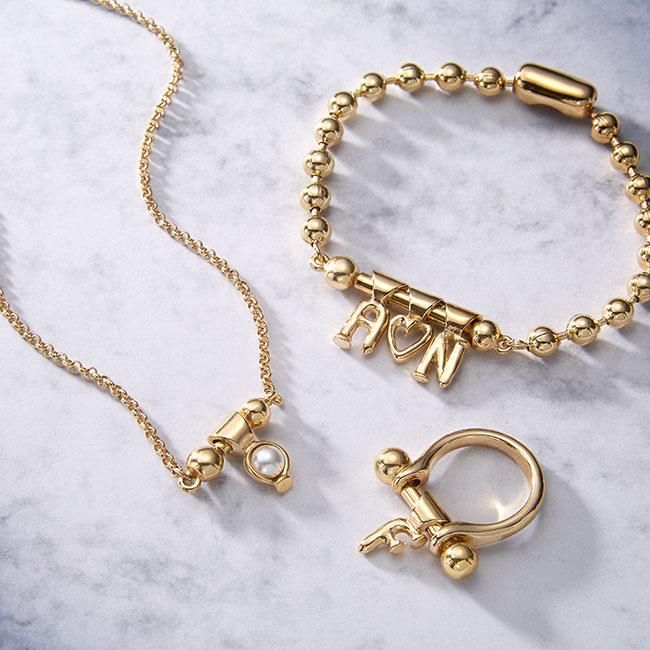 Joyas personalizadas de Uno de 50