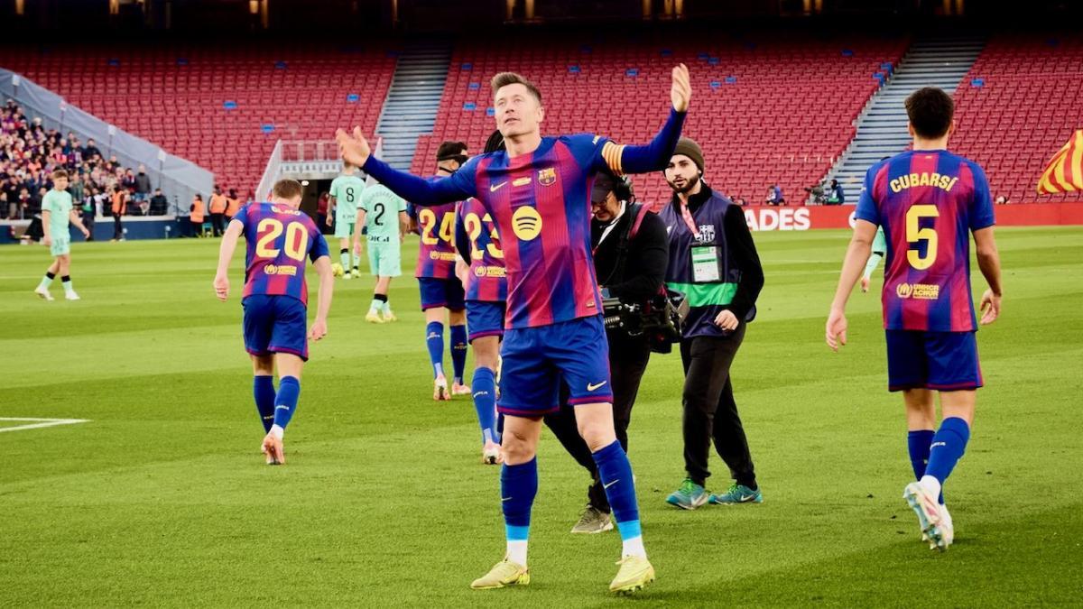 Robert Lewandowski celebrates the first goal at the remodeled Spotify Camp Nou