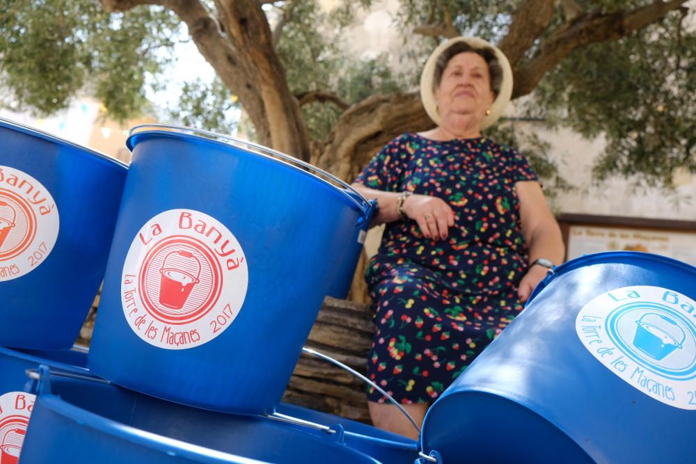 60.00 litros de agua en honor a la Virgen de la Asunción