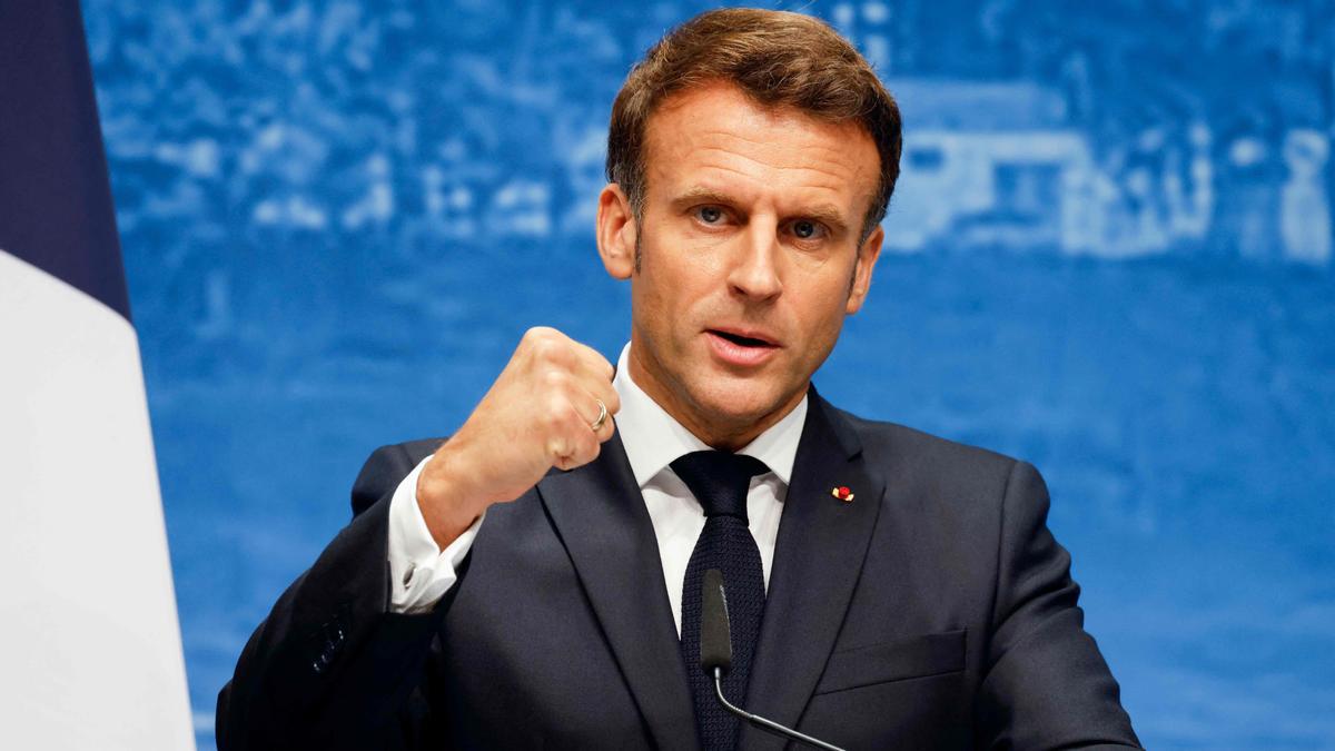 TOPSHOT - French President Emmanuel Macron holds a press conference on June 28, 2022 at Elmau Castle, southern Germany, during the G7 Summit. (Photo by Ludovic MARIN / AFP)