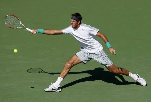 Del Potro reaches for a return to Nadal during their ATP men's singles tennis final at the BNP Paribas tournament in Indian Wells