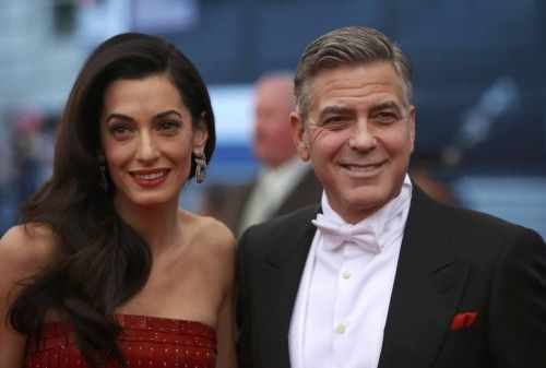 U.S. actor Clooney arrives with his wife Amal for the Metropolitan Museum of Art Costume Institute Gala 2015 celebrating the opening of "China: Through the Looking Glass," in Manhattan