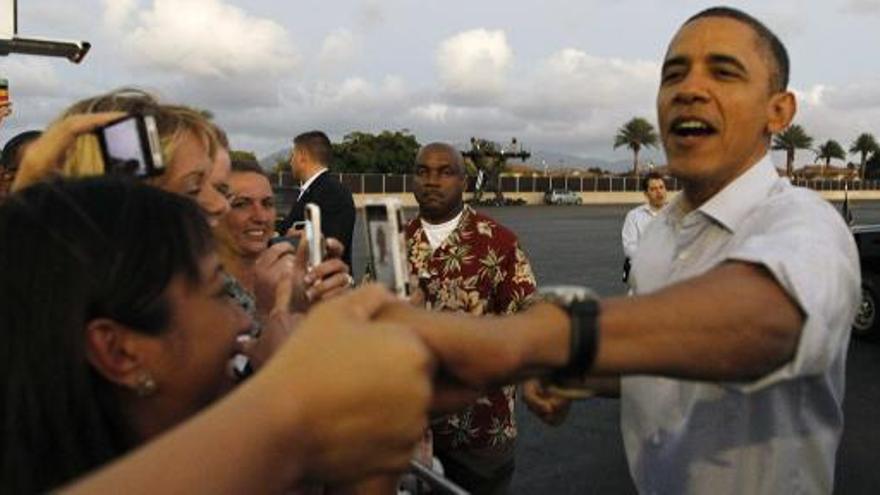 Obama, a su llegada a la base de Hawai, donde pasará las Navidades.