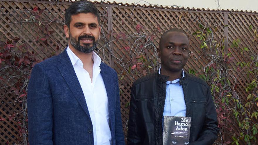 Nicolás Castellano junto al padre de Adou, Ali Quatara, en Madrid.