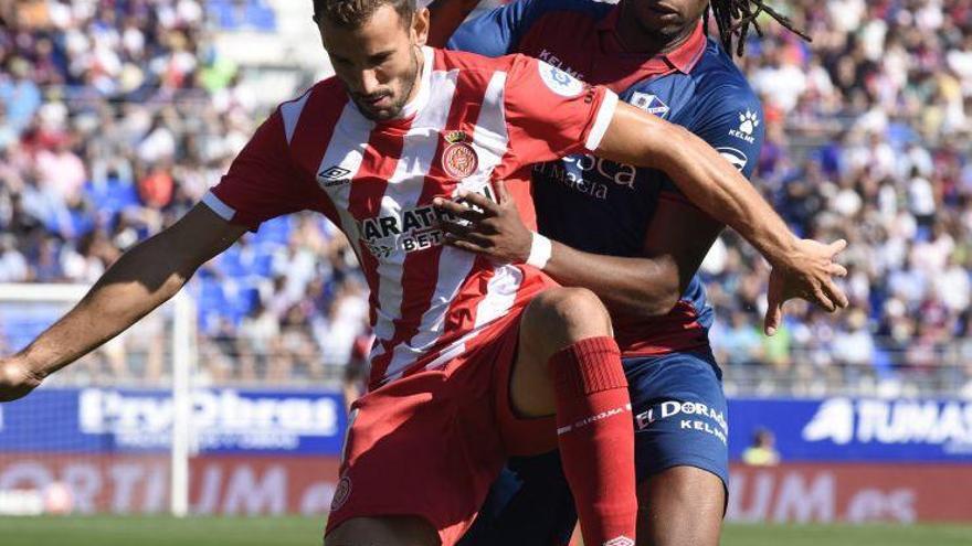 El Huesca juega con el corazón para salvar un punto