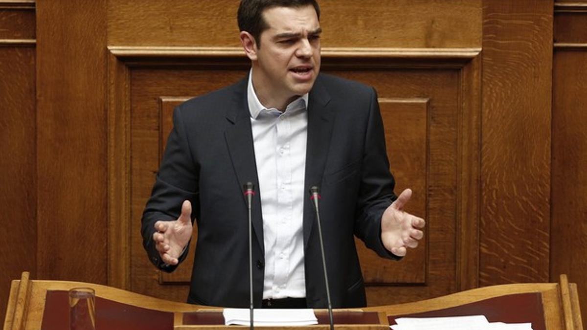 Greek Prime Minister Alexis Tsipras delivers his first major speech in parliament in Athens