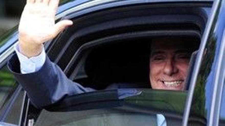 Berlusconi acude a los tribunales en plena jornada electoral