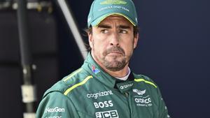 Aston Martin driver Fernando Alonso of Spain walks through pits after failing to finish qualifying session for the Austrian Formula One Grand Prix at the Red Bull Ring racetrack in Spielberg, Austria, Saturday, June 29, 2024. (AP Photo/Christian Bruna, Pool). POOL PHOTO
