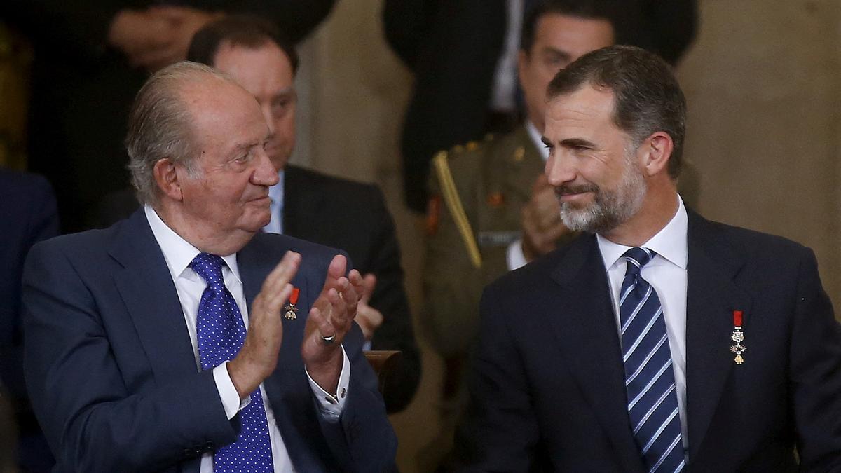 Juan Carlos I y Felipe VI.