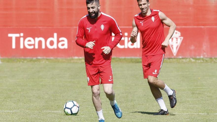 Santos trabaja junto a Santana al margen del grupo en el entrenamiento de esta mañana en Mareo