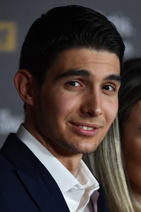 Formula 1's French driver Esteban Ocon poses upon arrival at the 2018 FIFA Ballon d'Or award ceremony at the Grand Palais in Paris on December 3, 2018. - The winner of the 2018 Ballon d'Or will be revealed at a glittering ceremony in Paris on December 3 evening, with Croatia's Luka Modric and a host of French World Cup winners all hoping to finally end the 10-year duopoly of Cristiano Ronaldo and Lionel Messi. (Photo by FRANCK FIFE / AFP)