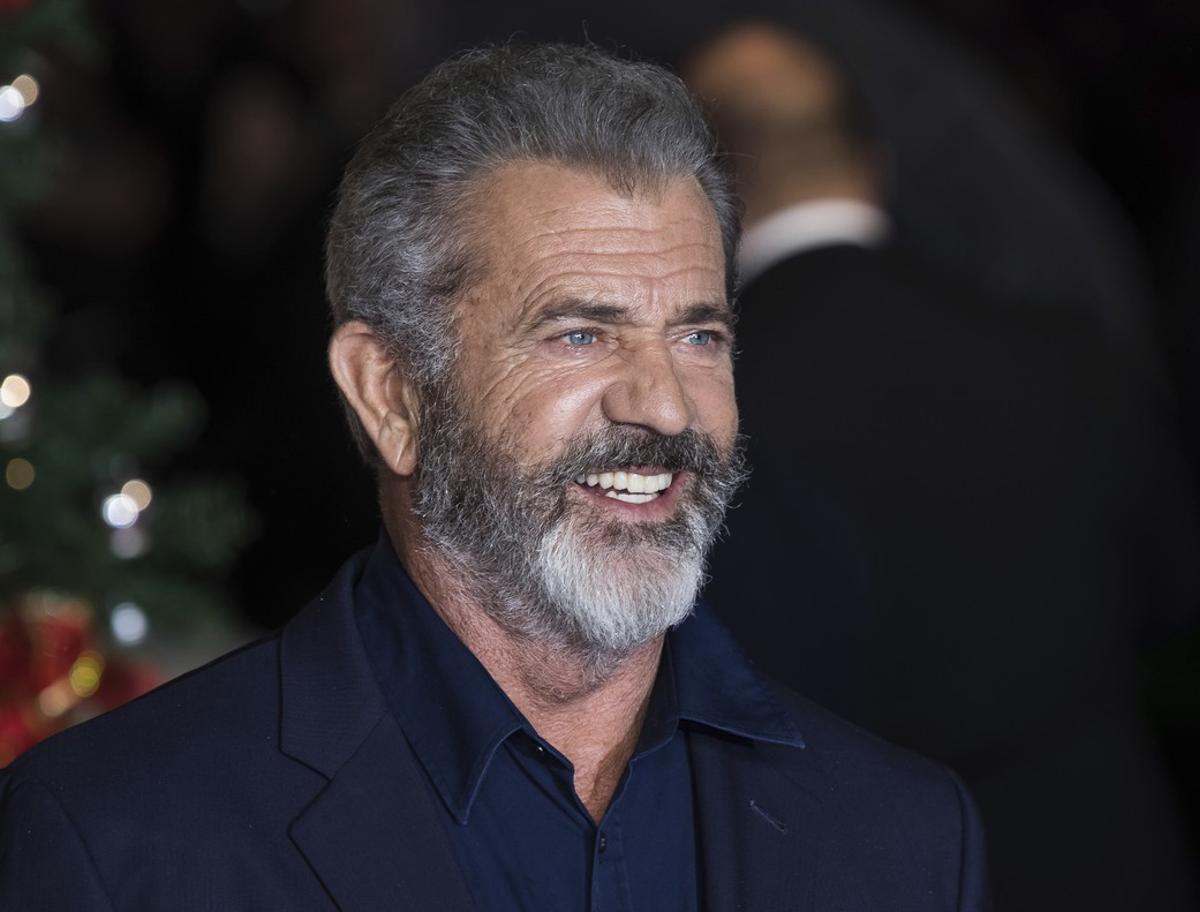 FILE - In this Nov  16  2017 file photo  Mel Gibson arrives at the premiere of  Daddys Home 2   in London  Gibson will co-write and direct a remake of Sam Peckinpaha  s classic Western a  The Wild Bunch a   Warner Bros  on Monday confirmed that Gibson will helm the production  with Bryan Bagby to co-write the script with him  It will be Gibsona  s first time directing since his 2016 World War II drama a  Hacksaw Ridge a   for which Gibson earned a best directing Oscar nomination   Photo by Vianney Le Caer Invision AP  File