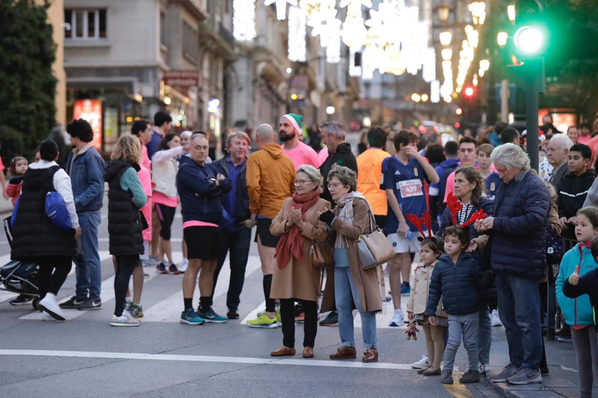 En imágenes: Jaime Bueno (Univerisad de Oviedo) y Mariam Benkert triunfan en la San Silvestre de Oviedo