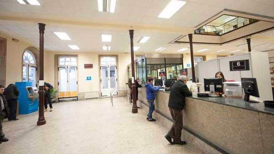 Oficina de la recaudación municipal en A Coruña. / 13Fotos