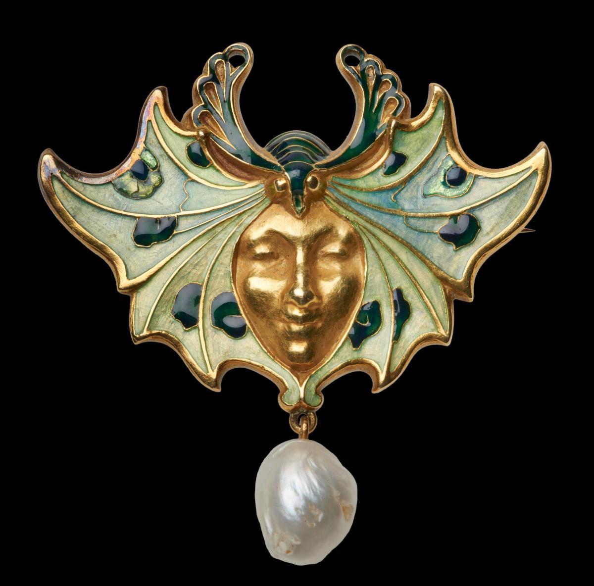 Broche Máscara y plumas de pavo real