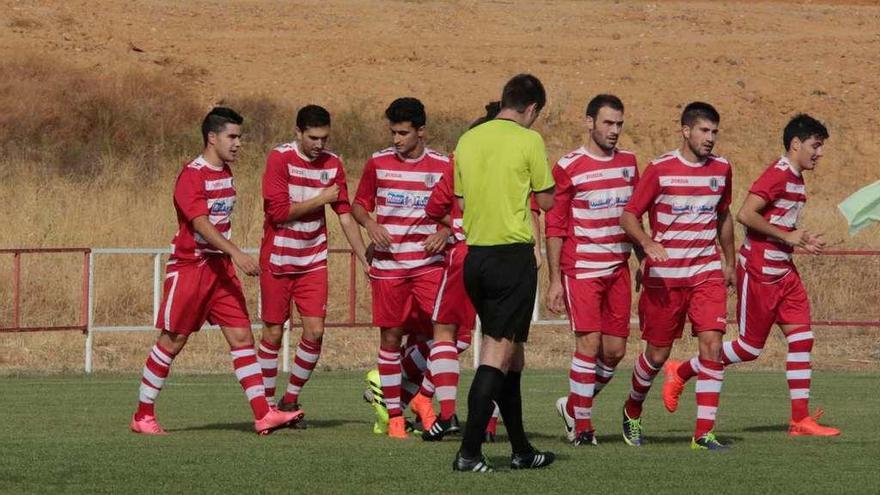 Varios jugadores del Fresno, durante un partido.