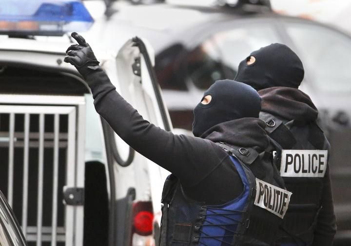 Belgian police stage raid in Brussels suburb of Molenbeek