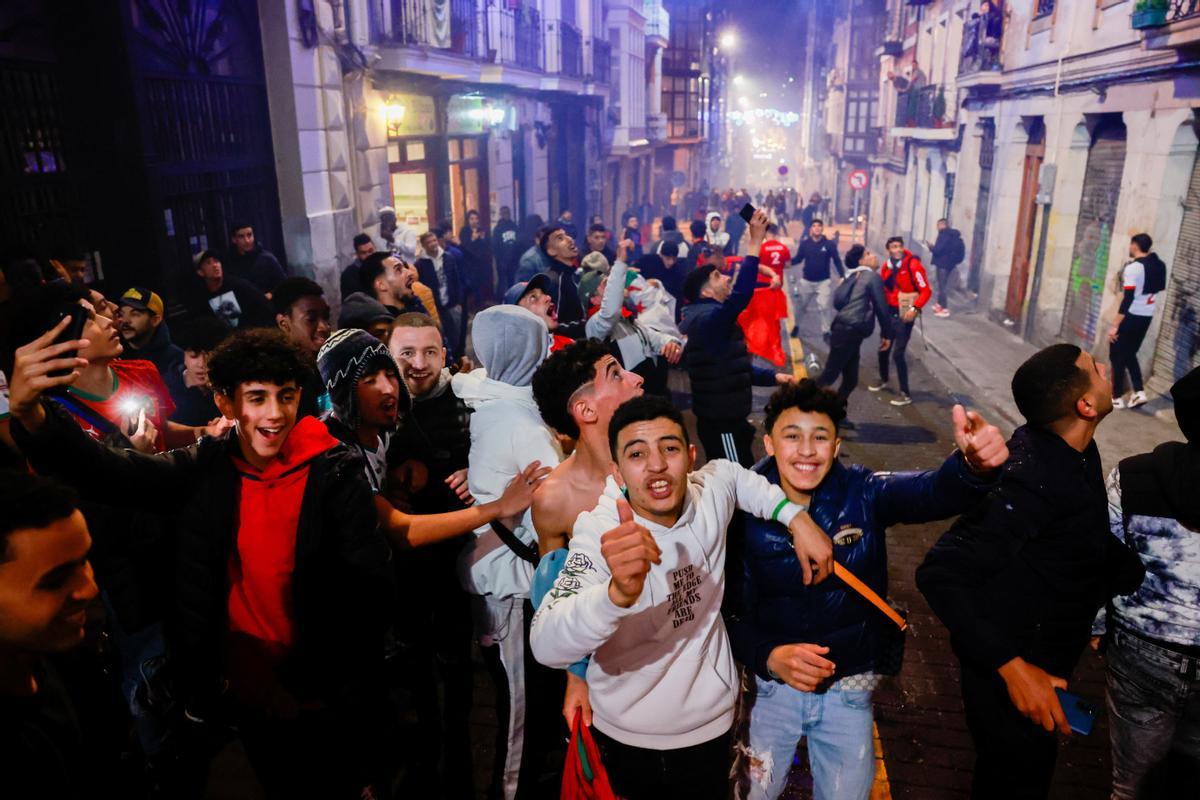 Morocco fans gather to celebrate their teams victory against Spain in Bilbao