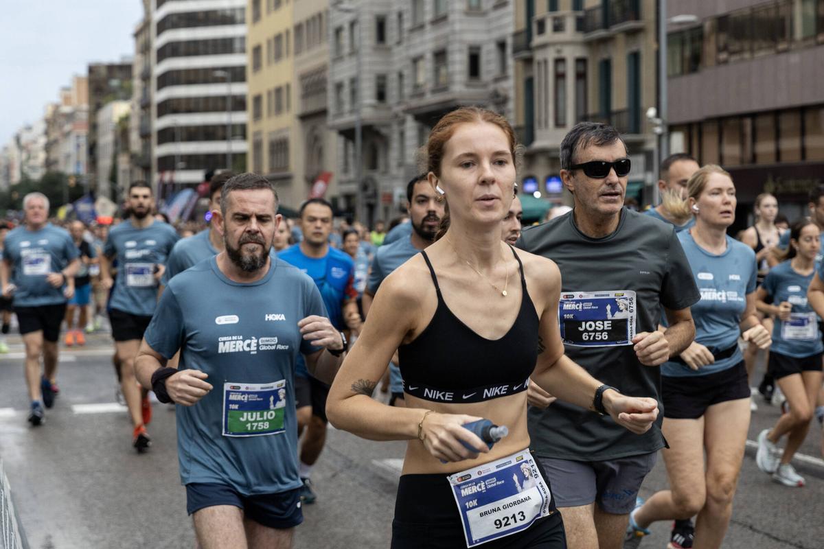 14.000 corredores participan en esta edición de la Cursa de la Mercè, en Barcelona.